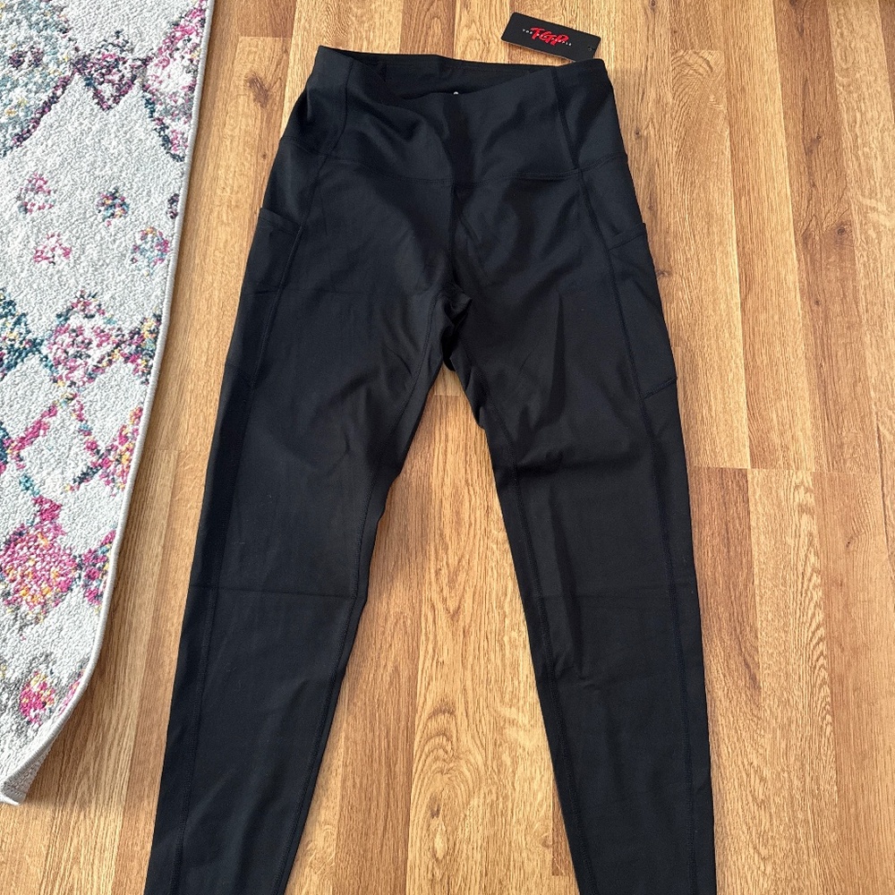 Women’s black leggings- new with tags- L